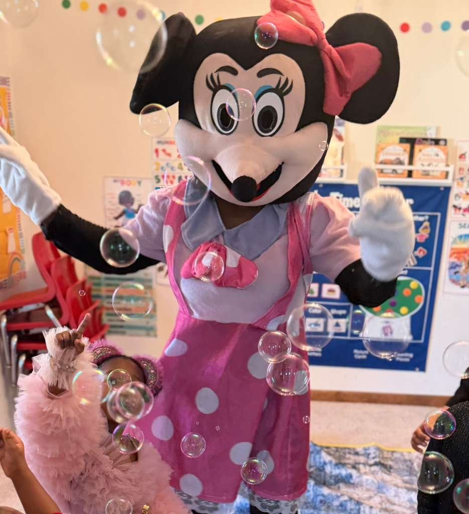 Classroom with alphabet rug and educational environment at Graceland Kids Center